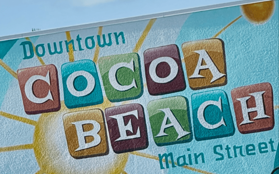 Downtown Cocoa Beach sign near local shops and restaurants